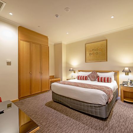 Duxton Hotel Perth Exterior foto A bedroom at the hotel